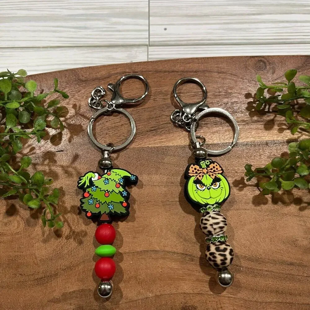 Grinch Bar Keychains in Festive Tree and Leopard Beads for Holiday Gifts - Picture 1 of 3